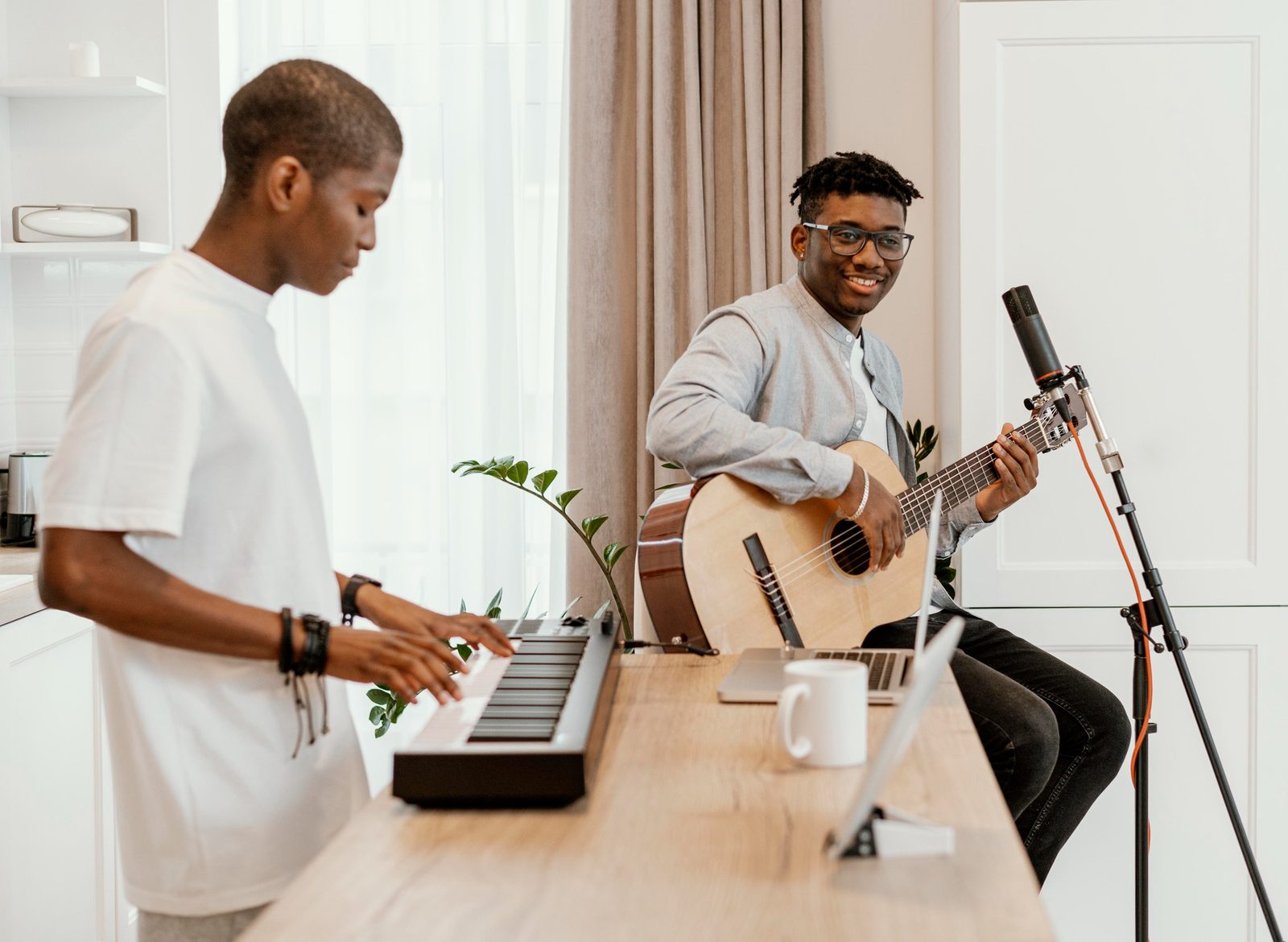 Wide, cinematic hero-style photo of GIME at work — a studio, classroom or team moment that captures the brand's energy.